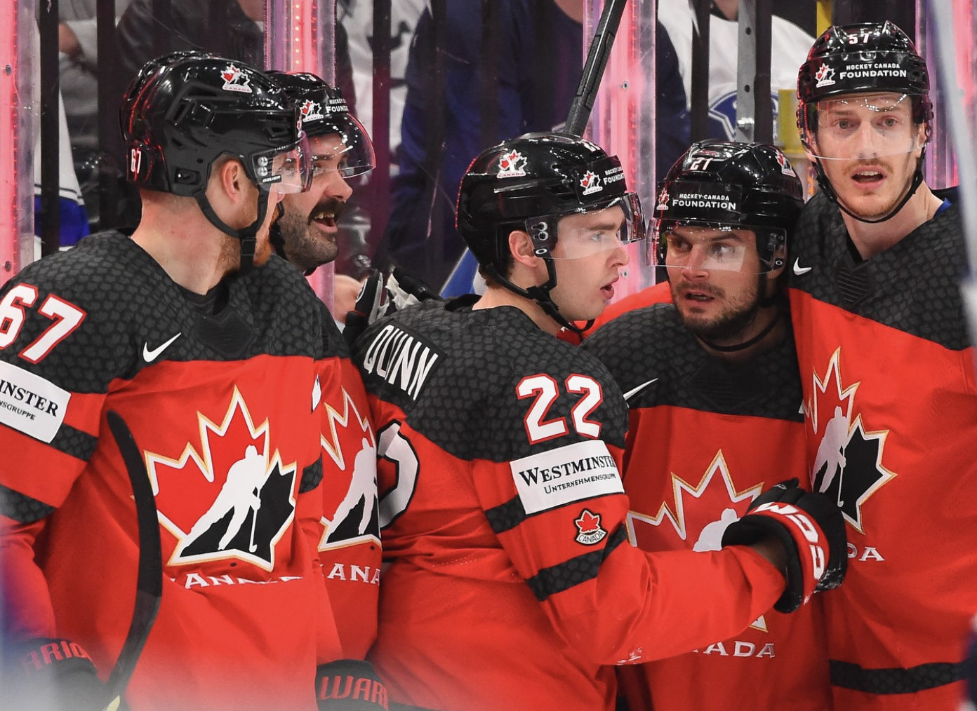 Scott Laughton (second from right) celebrates Canada goal.
