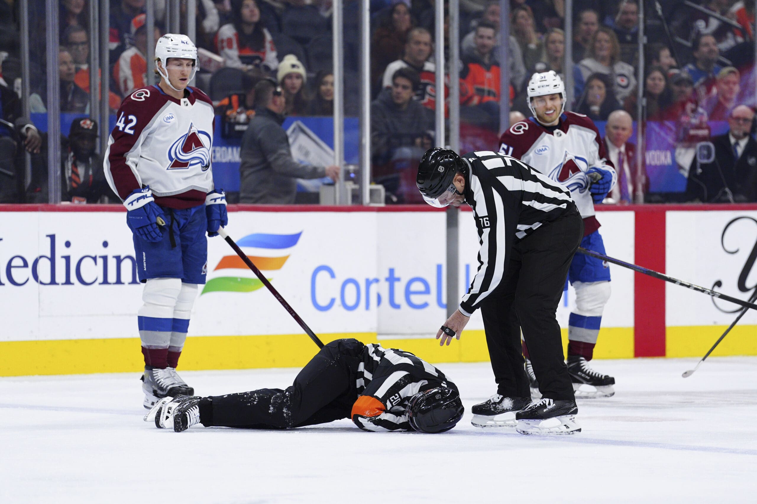 NHL referee Mitch Dunning injured on the ice