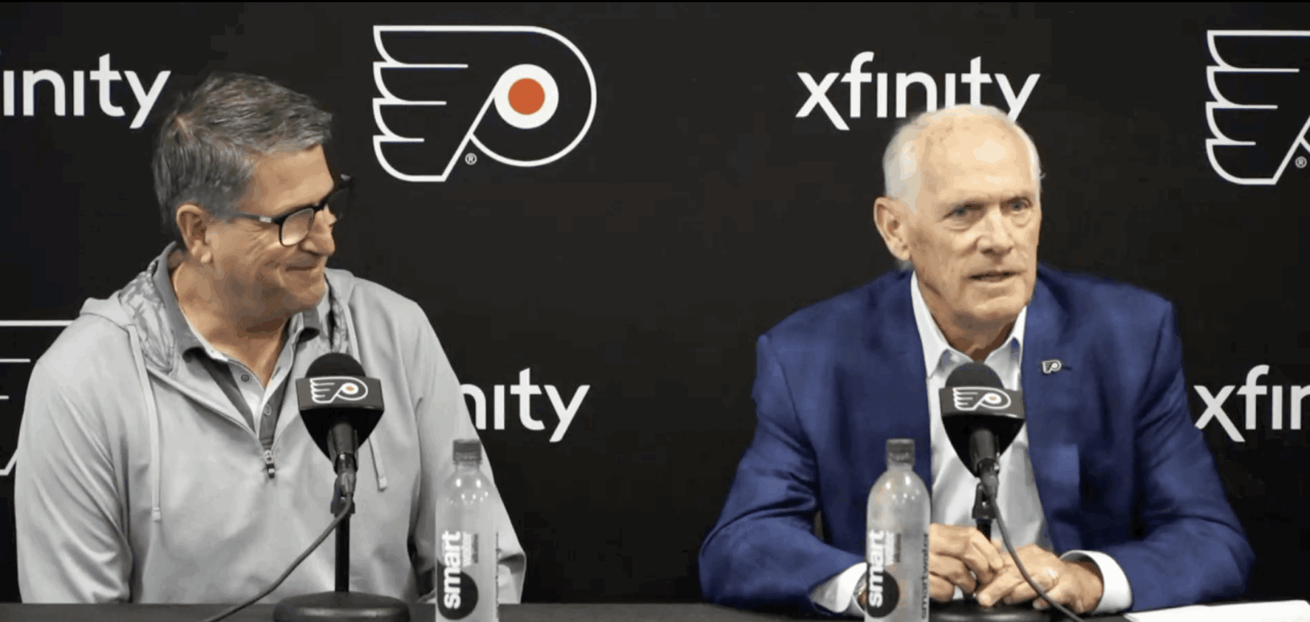 Flyers President of Hockey Operations Keith Jones and Comcast Spectacor CEO and Govoner of the Flyers Dan Hilferty address the media in Voorhees, NJ.